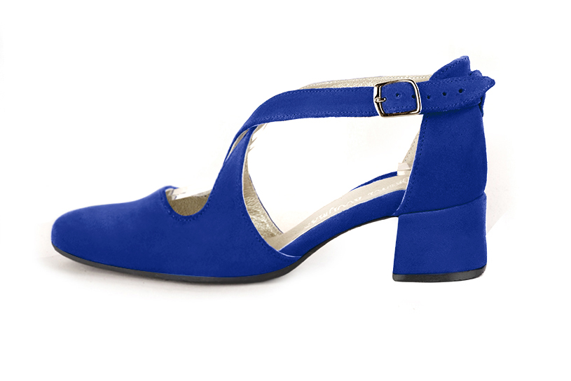 Women's electric blue elegant closed-back heels, with crossed straps. .  - Profile view